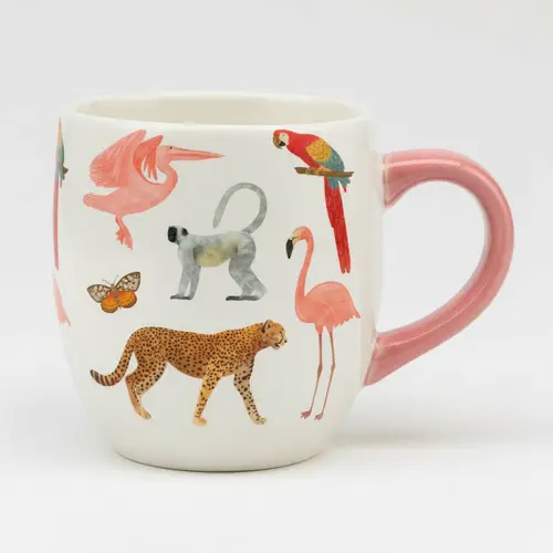 White ceramic mug with a pink handle and colorful illustrations of a bird, flamingo, monkey, spotted cat and butterflies.