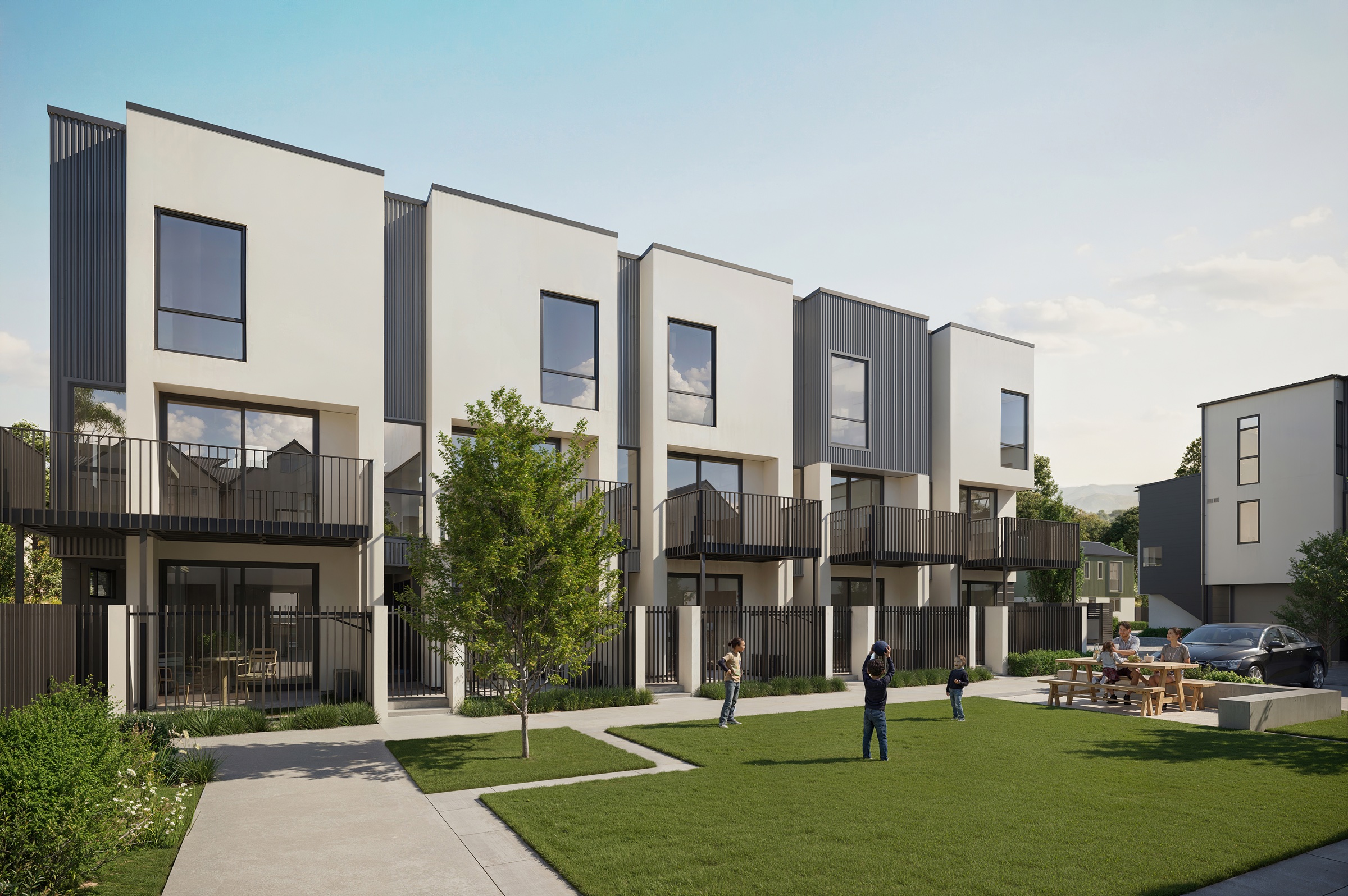 Artist's impression of Leander Common east common green with landscaped lawn and townhouses