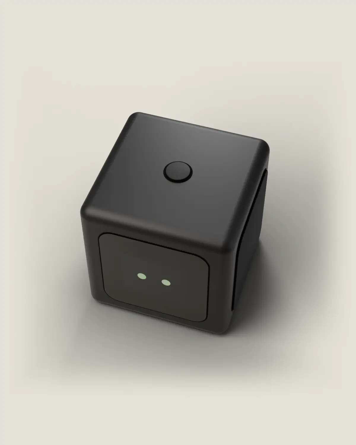 Tomi cube, one button on top, ready to be pressed