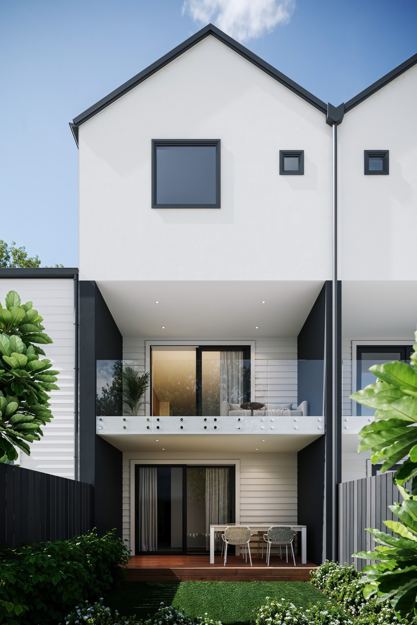 Artist's impression of a Seaside Place private courtyard, paved outdoor area and low-maintenance planting framed by contemporary townhouse architecture