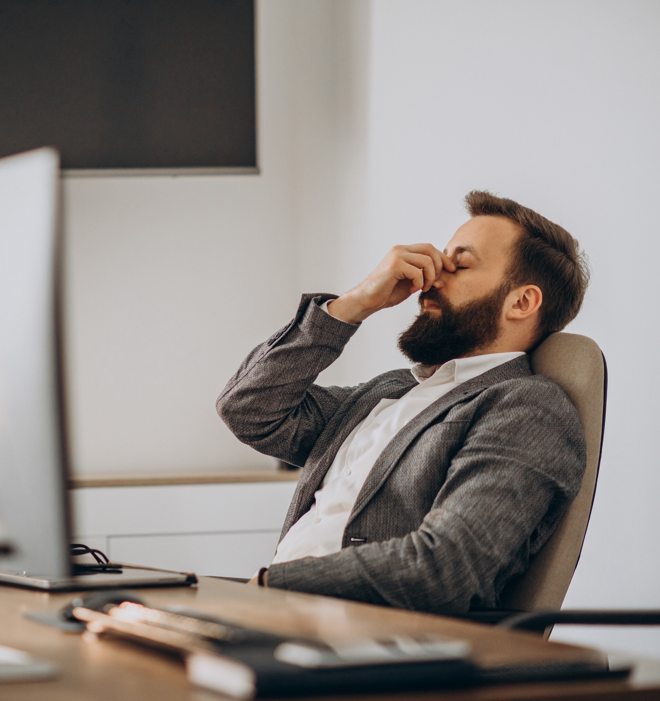 Frustrated businessman at desk