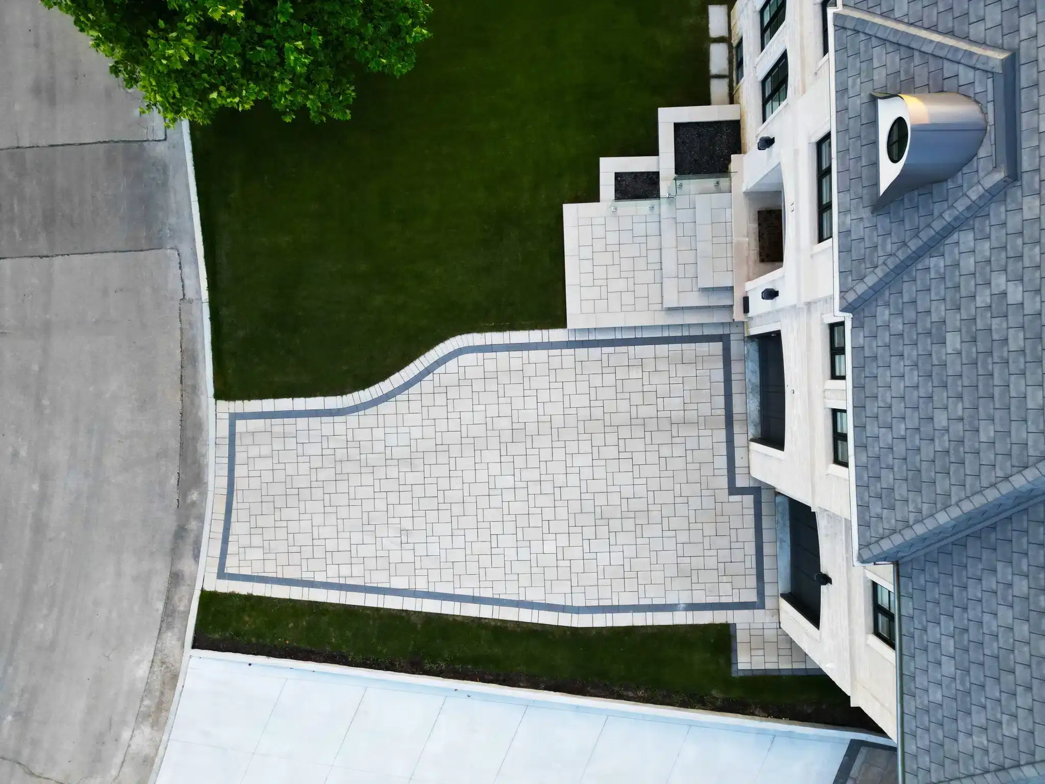 Aerial view of interlocking driveway installation in Toronto