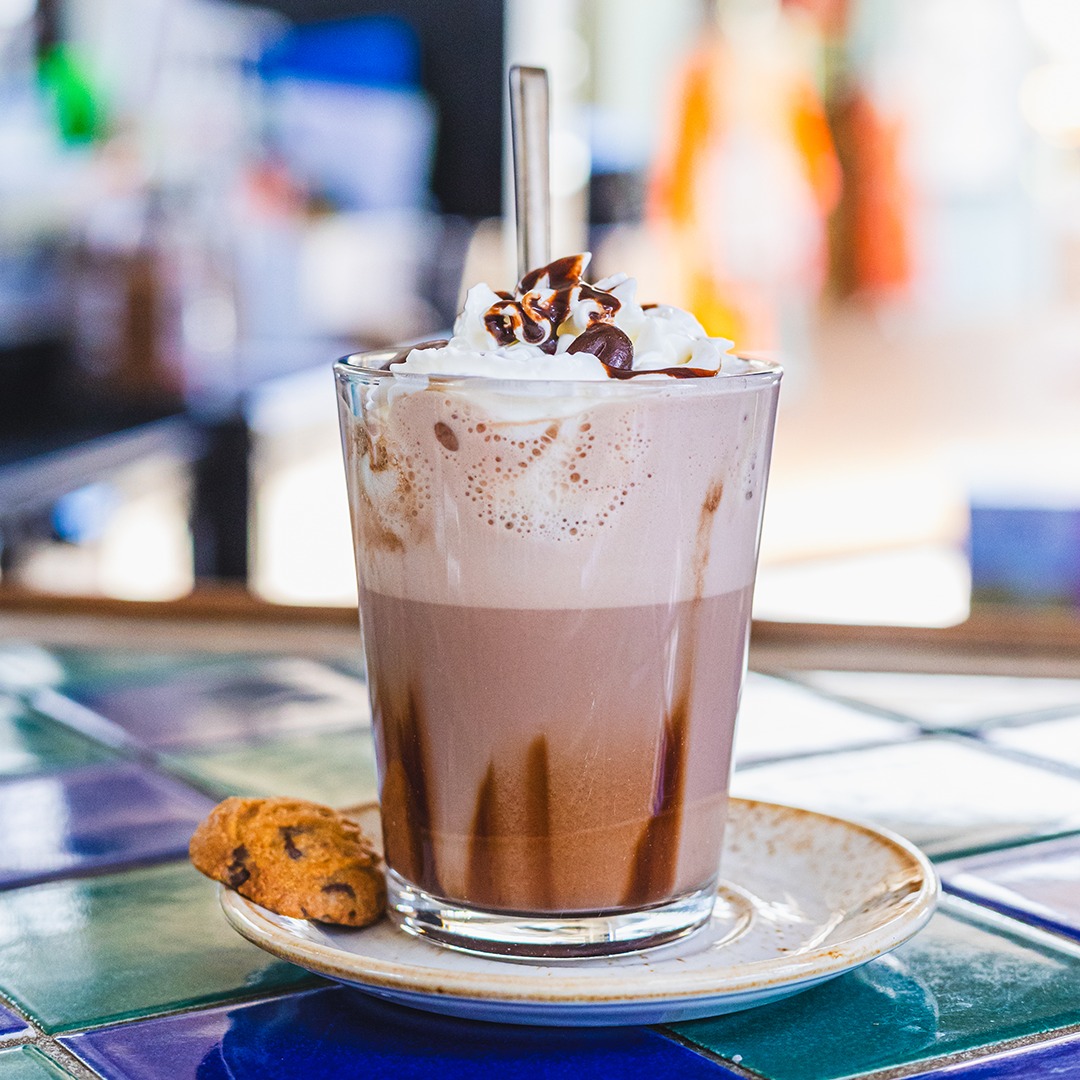 Iced chocolate drink with whipped cream