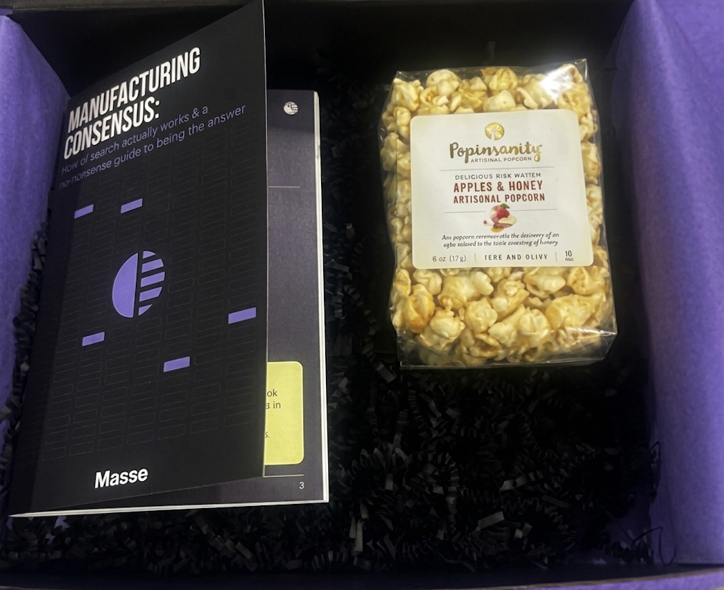 Masse Marketing box interior with booklet and popcorn