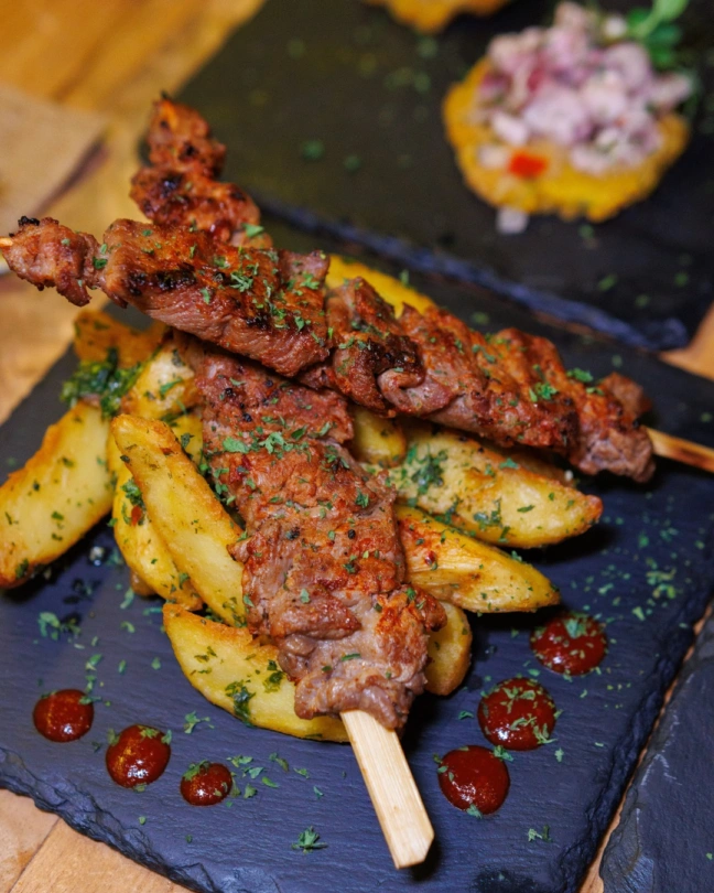 Grilled Meat Skewers with Potato Wedges