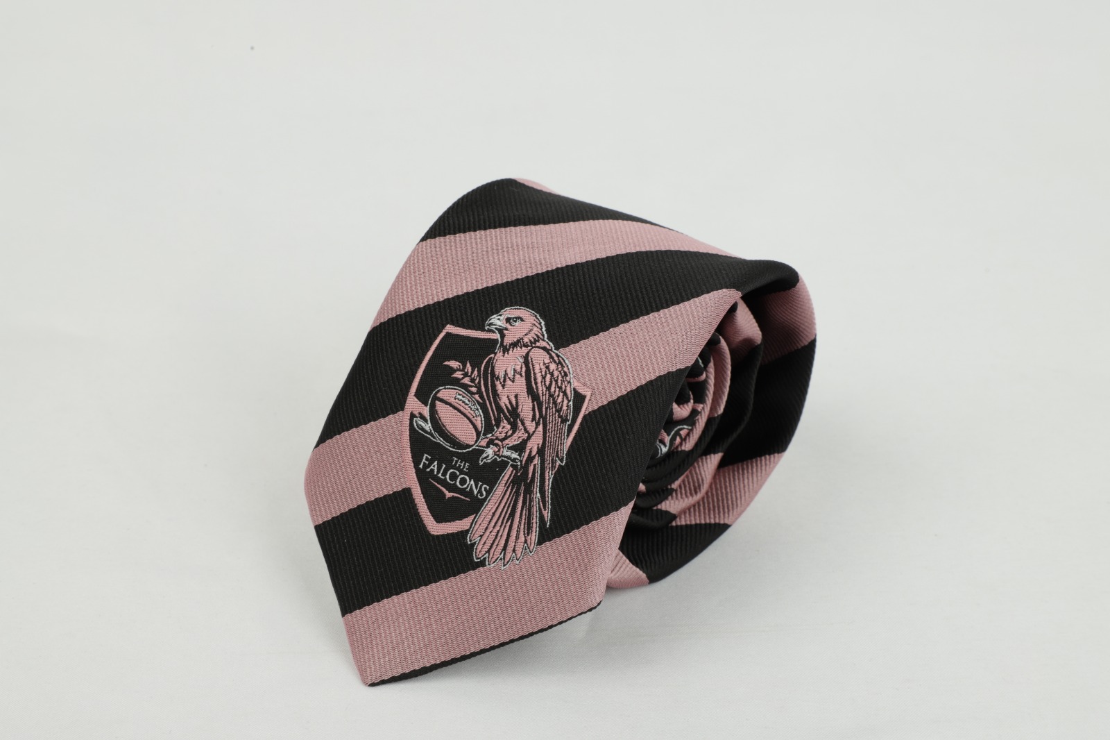 The Falcons custom pink and black falcon crest tie