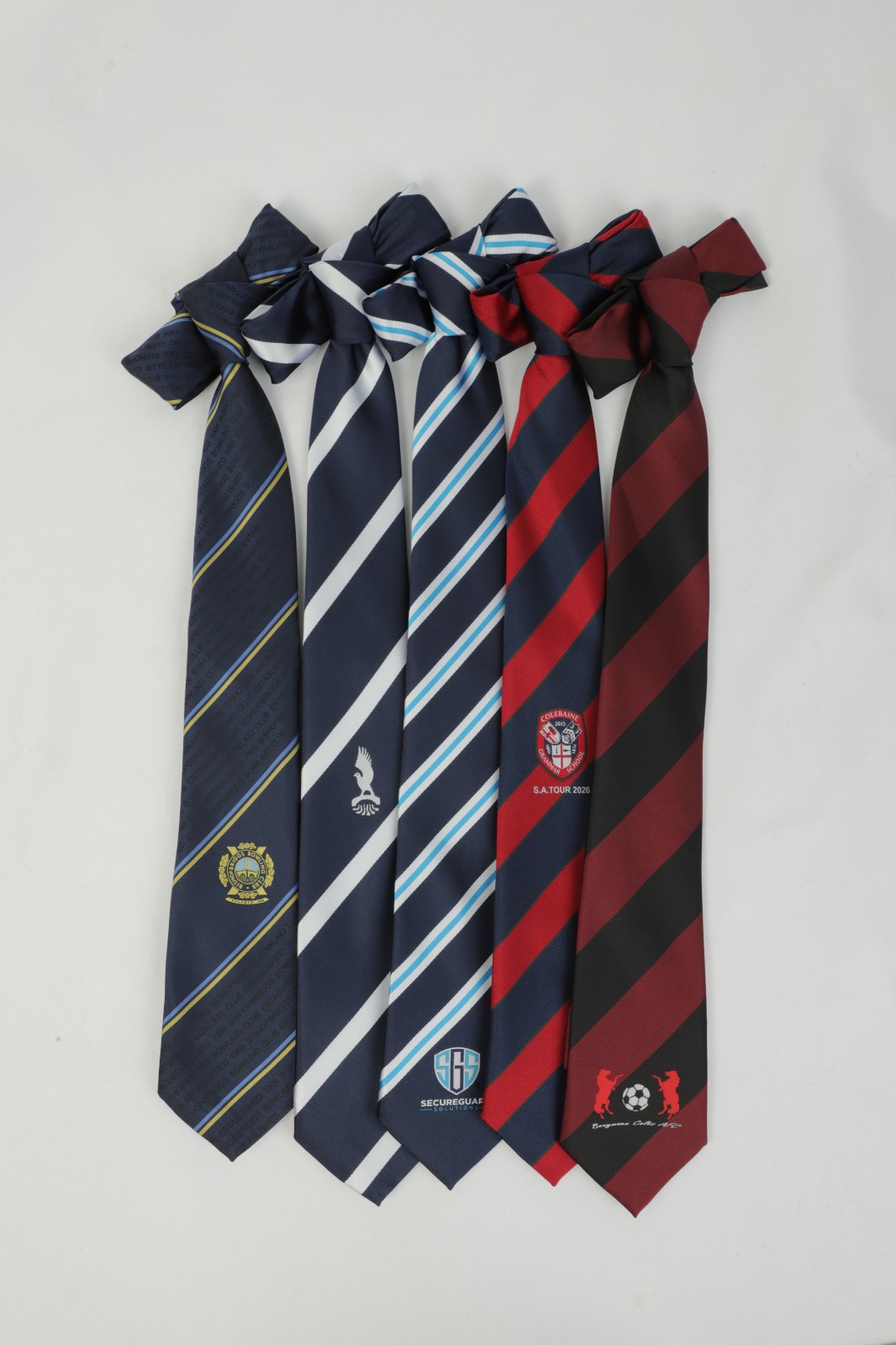 Embroidered crest club tie examples