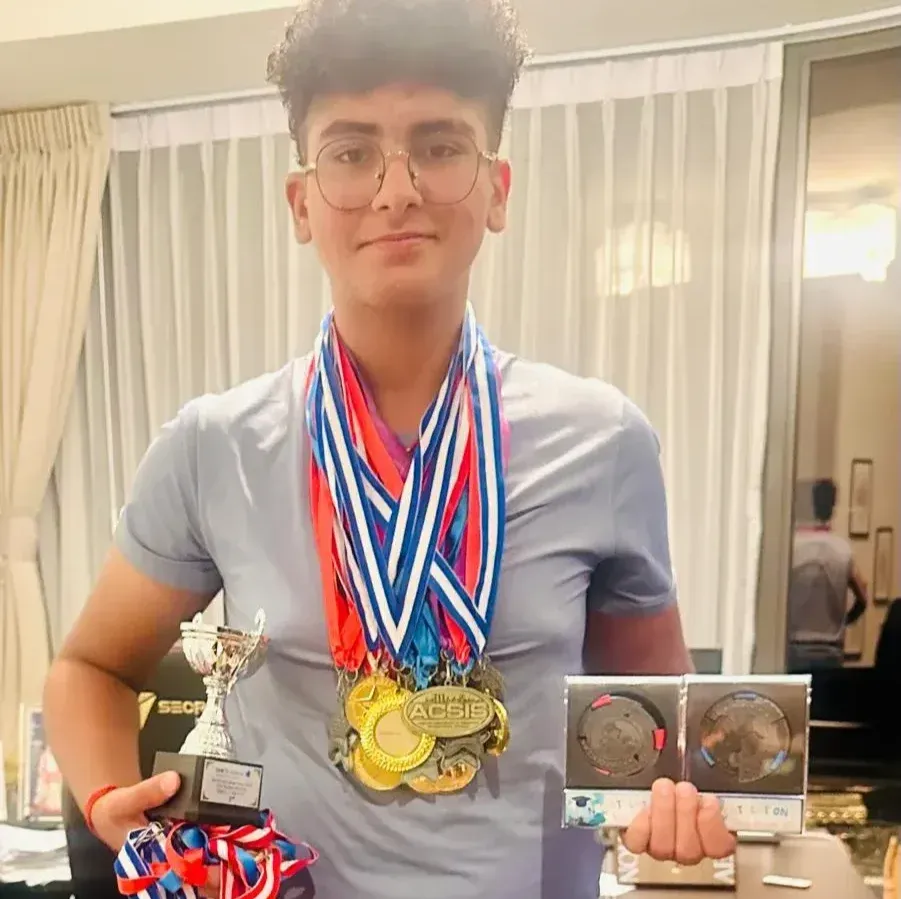 Aadi, Grade 7 MathFit Kid with AMC Distinguished Honor Roll medals