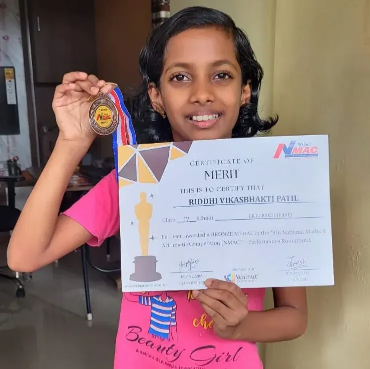 Riddhi, Grade 4 MathFit Kid with NMAC Bronze Medal