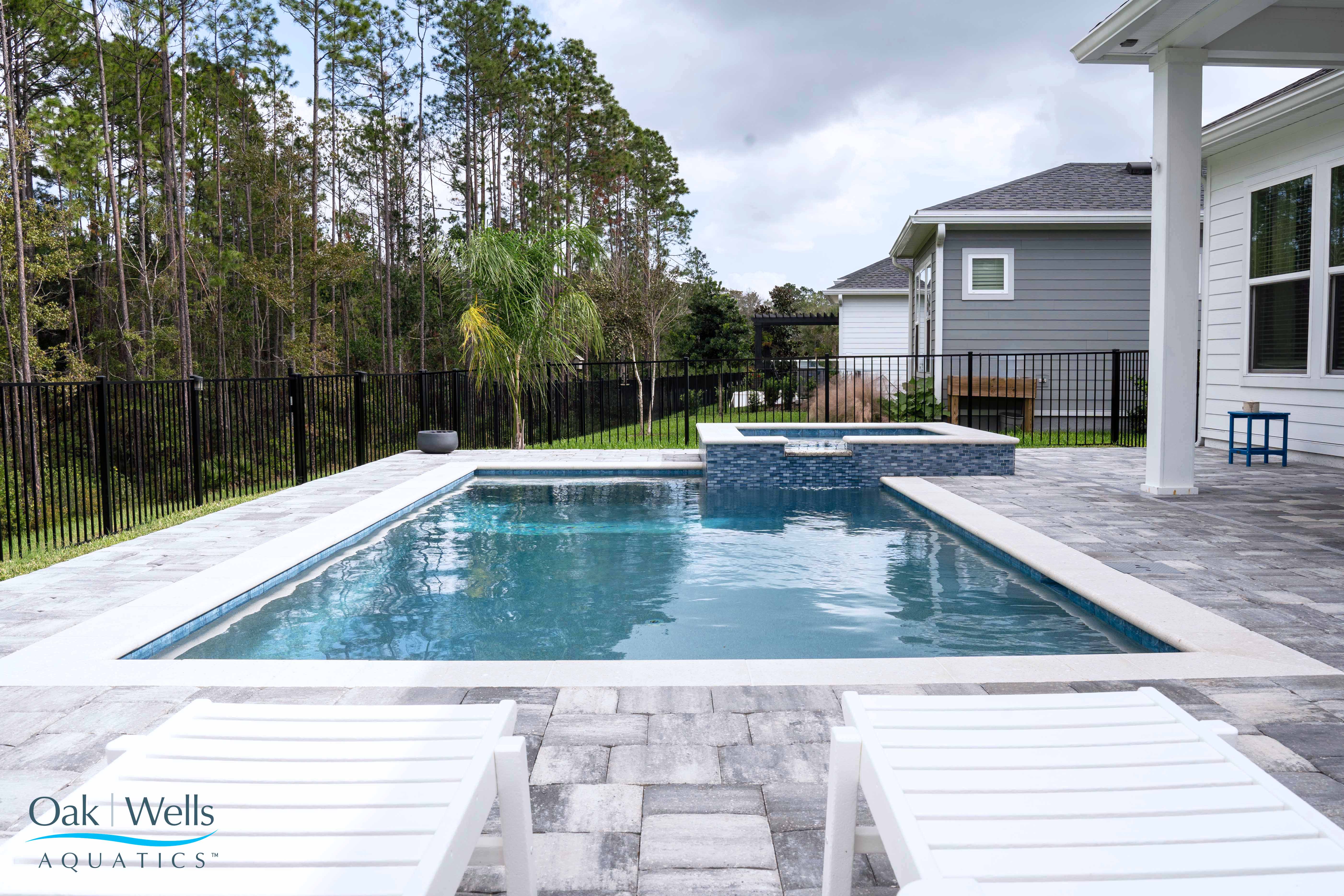 Modern Pool with Paver Deck