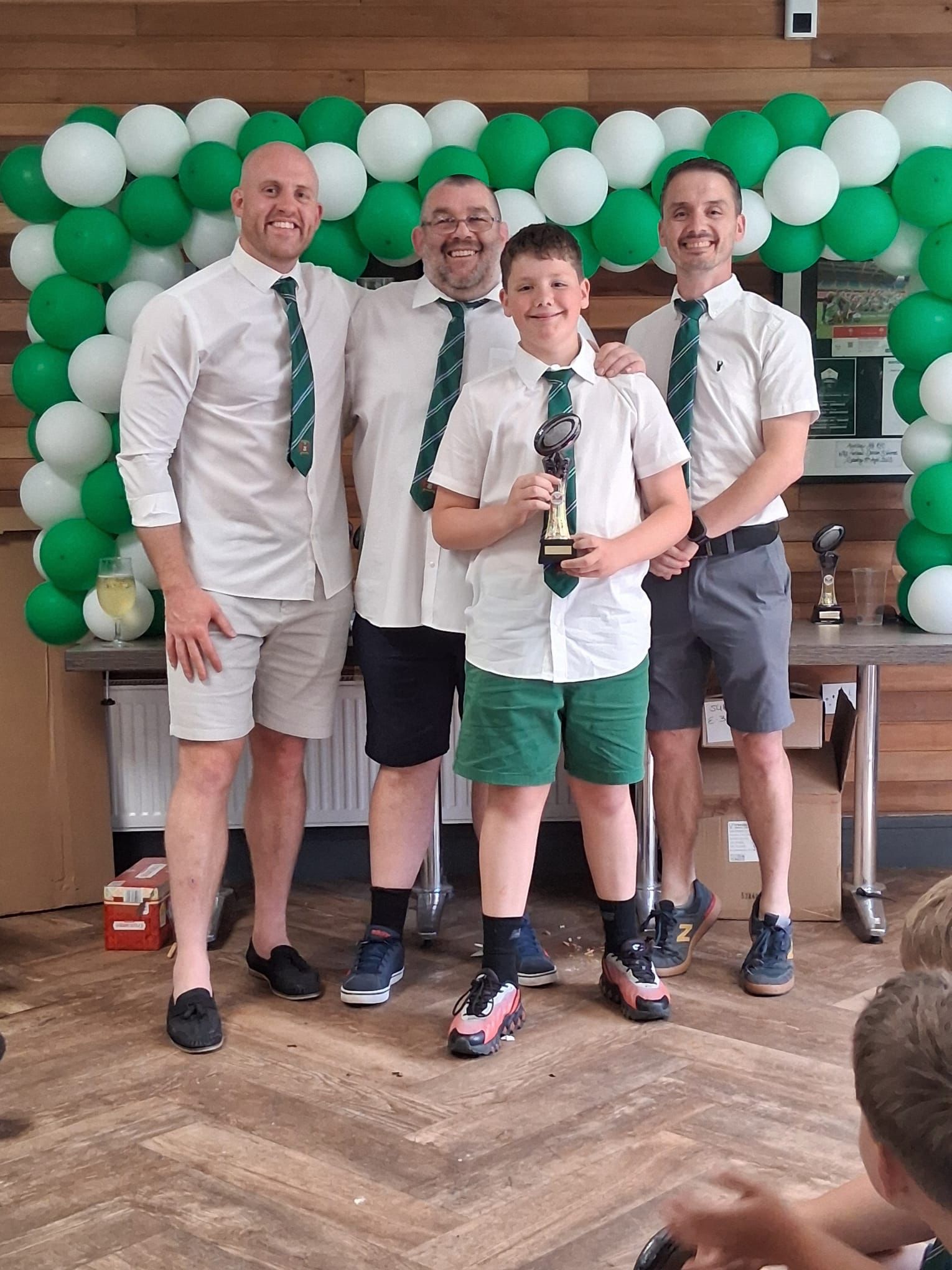 Aber Youth RFC coach and junior player with green striped ties