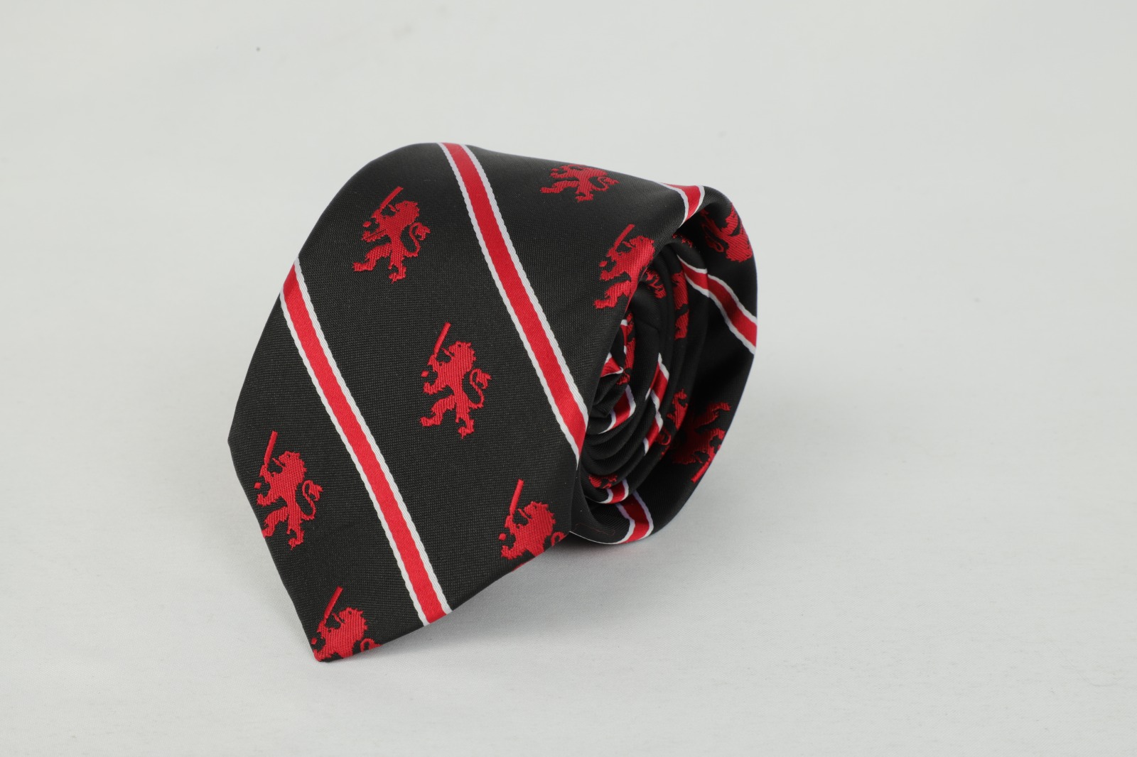 Hunslet Rugby League Club black red lion striped tie rolled