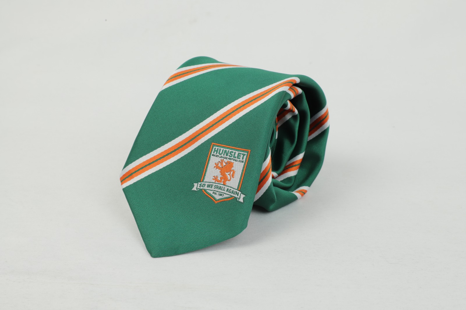 Hunslet Rugby League Club green white orange striped tie rolled