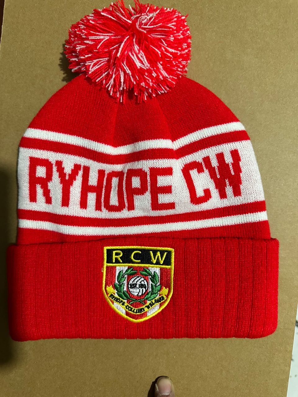 Ryhope CW custom red and white bobble hat with red, white and yellow RCW shield crest