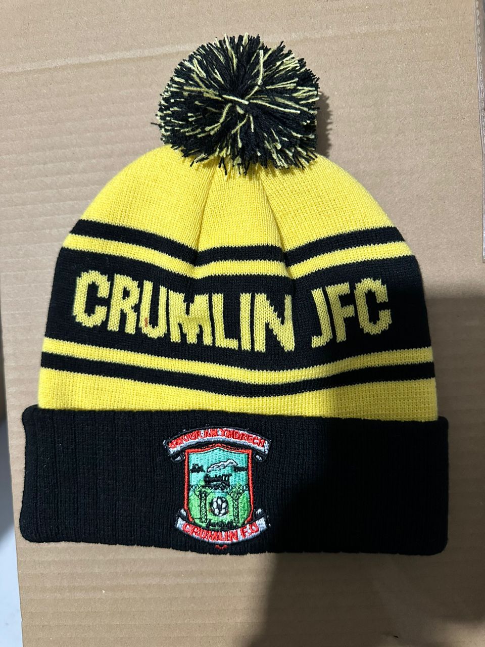 Crumlin JFC custom yellow and black bobble hat with embroidered club crest
