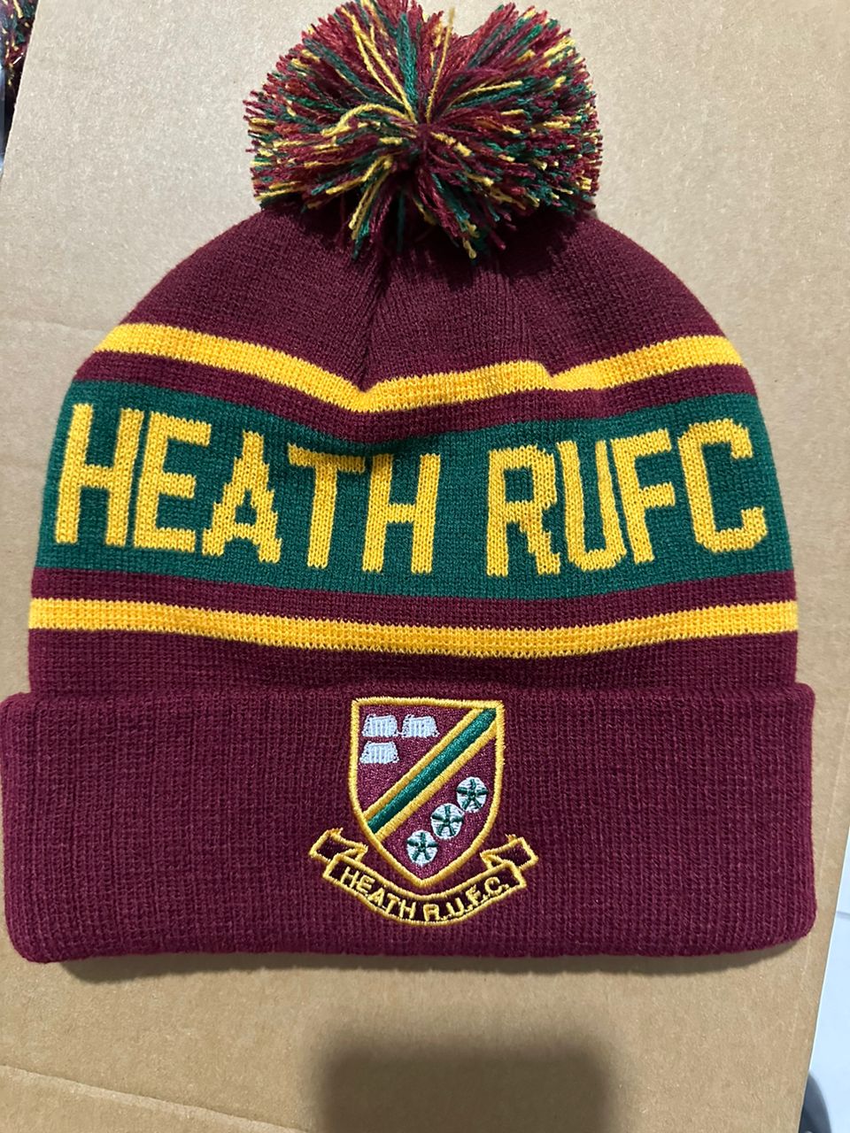 Heath RUFC custom maroon, green and yellow bobble hat with embroidered club crest
