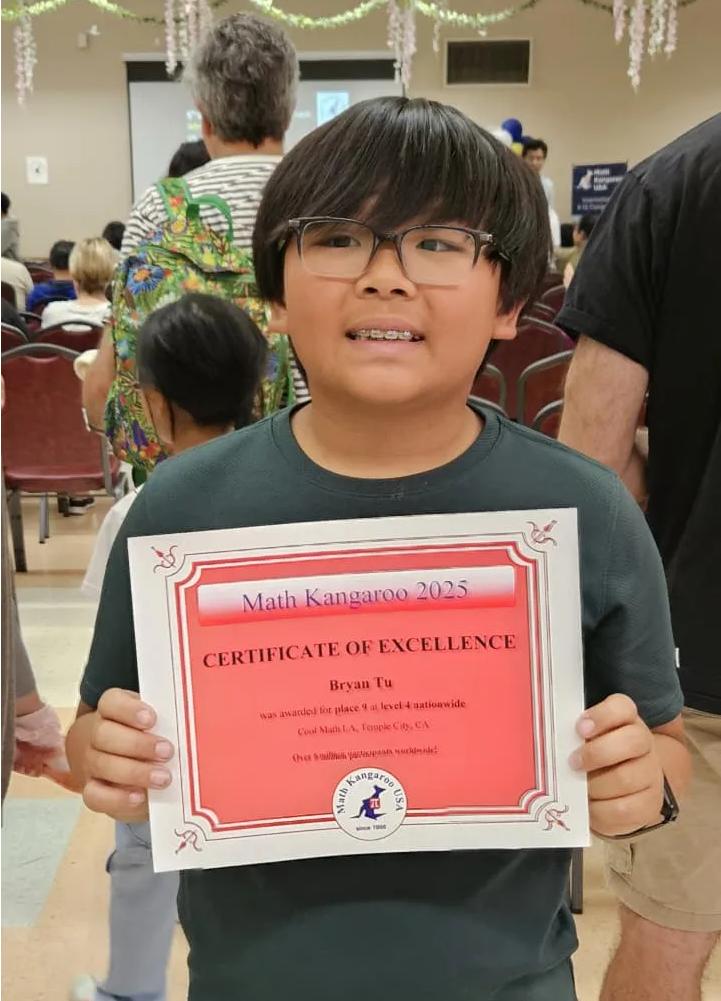 Bryan Tu, Grade 5, holding his Math Kangaroo 2025 Certificate of Excellence