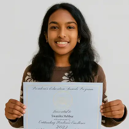 Swanika Hebbar, Cuemath student, holding the President's Education Awards Program certificate