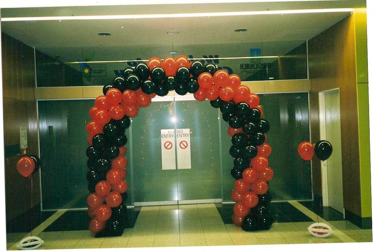 Red and black balloon archway