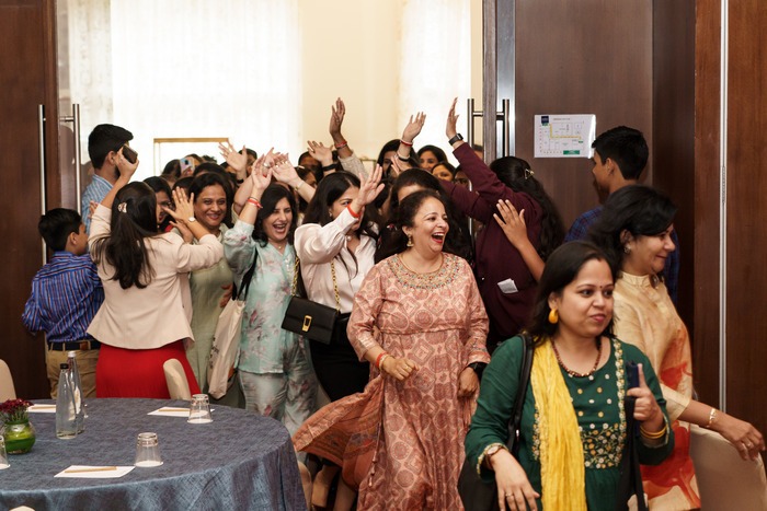 Participants cheering at the event