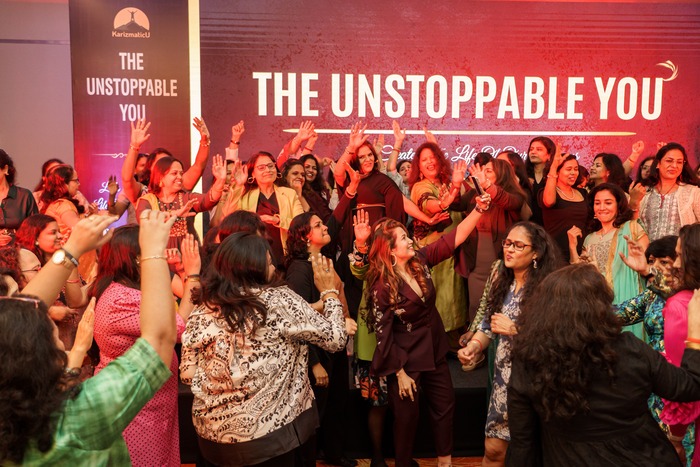 Participants celebrating on stage