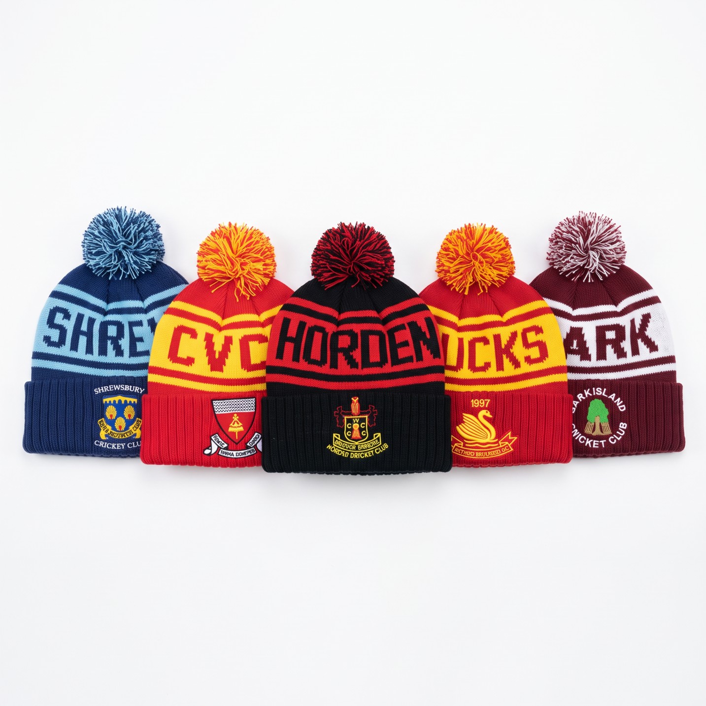 Five custom cricket club bobble hats arranged in a row on a white background — Shrewsbury CC, Worcester CC, Horden CC, Bucks CC and Barkisland CC