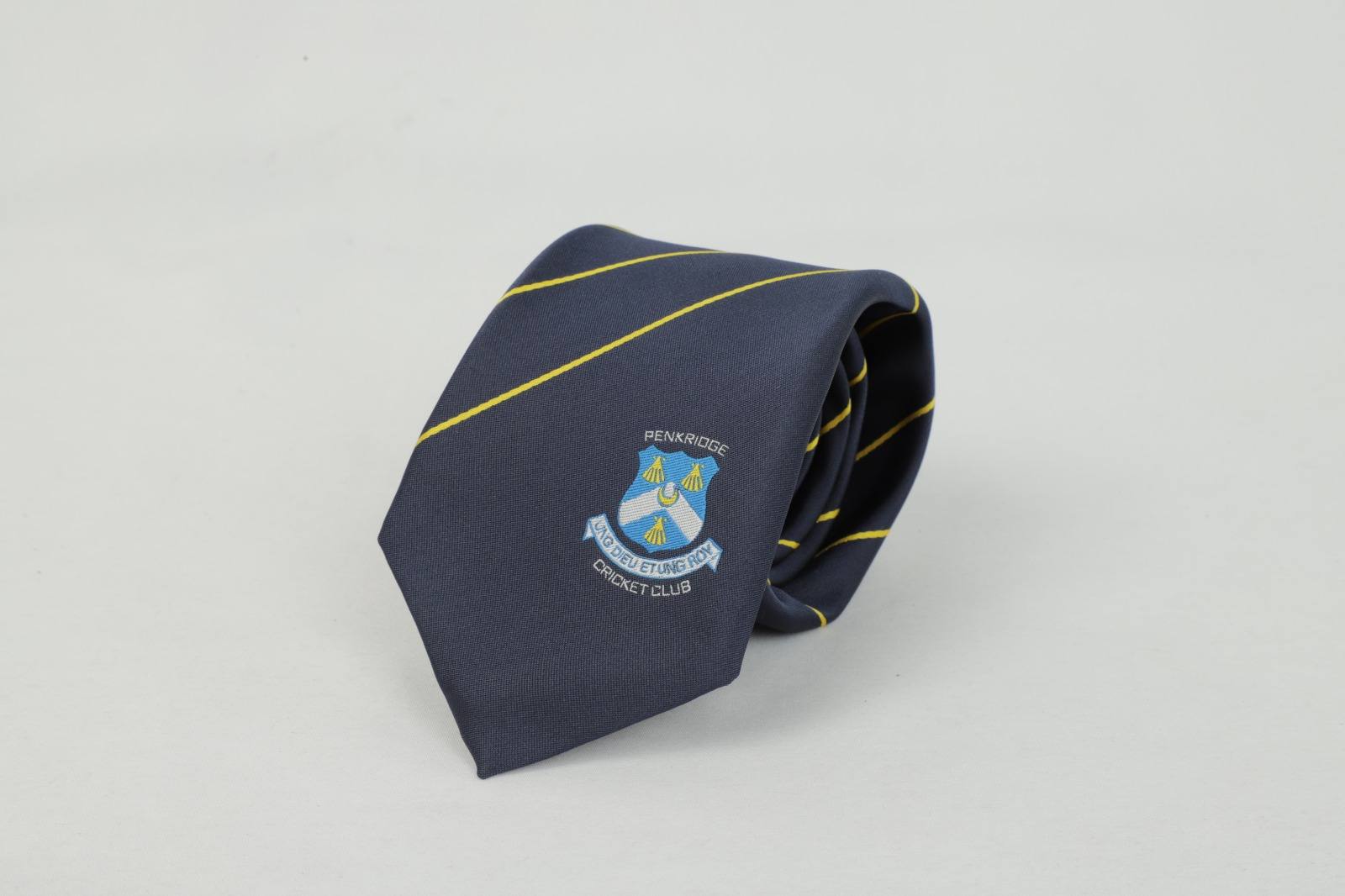 Penkridge Cricket Club custom navy and yellow striped tie with club badge