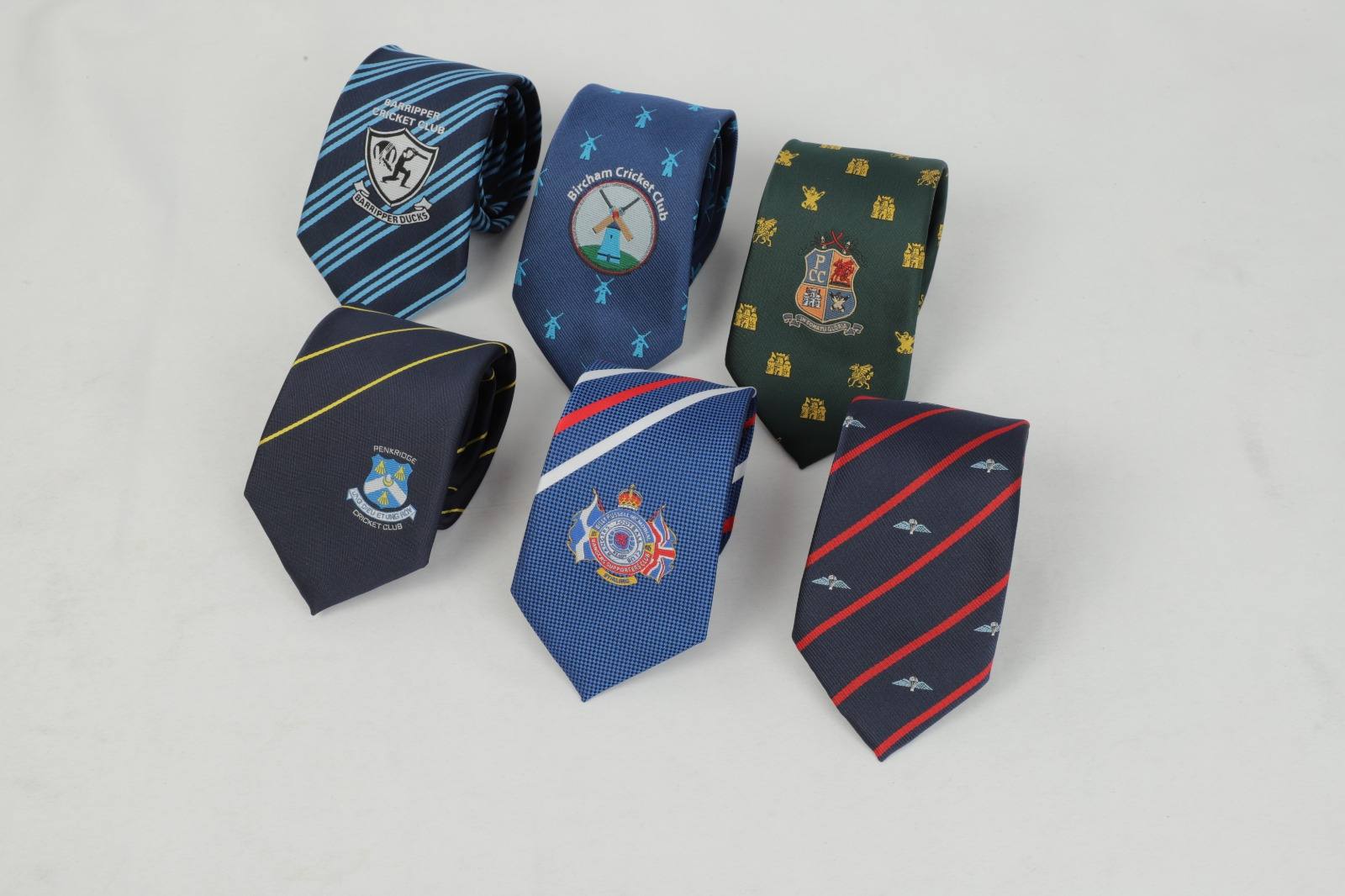 Collection of custom club ties including Barripper, Bircham, Penkridge, Royal British Legion and RAF designs