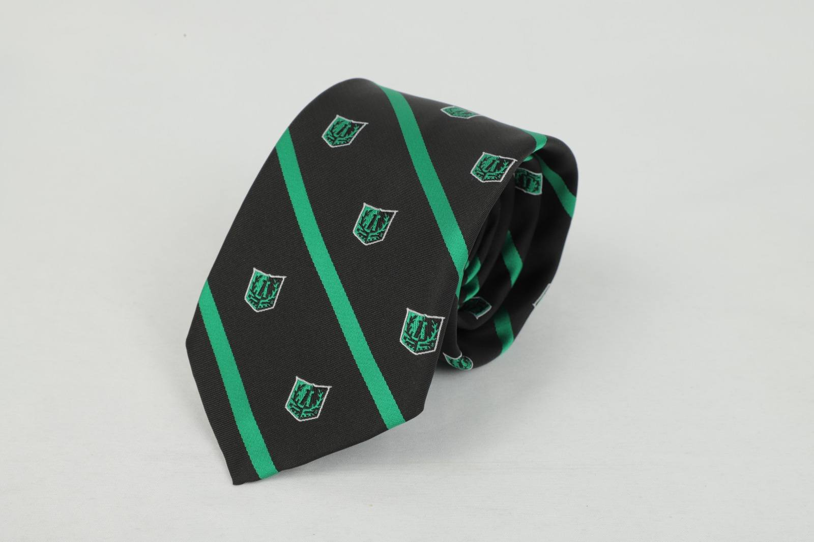 Custom black tie with green diagonal stripes and shield crest pattern