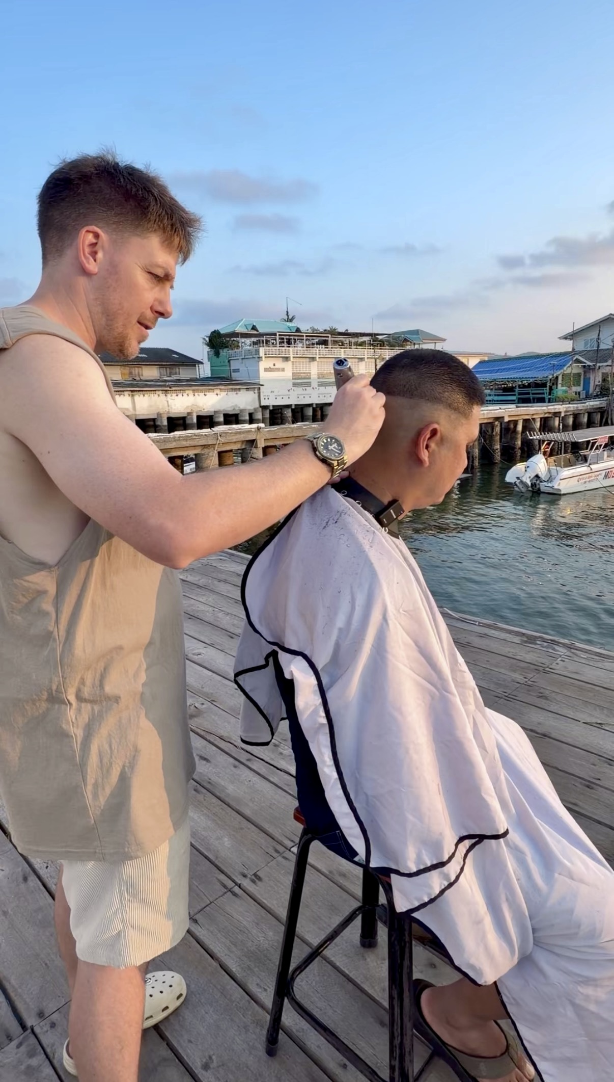 Barbers of Belgium providing on-location grooming at a waterfront brand activation
